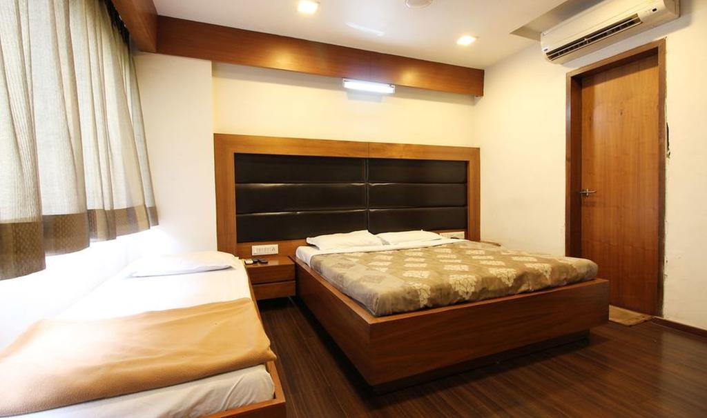 Hotel Kanak Comfort Ahmedabad Rom bilde